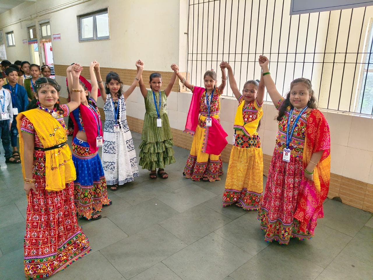 Students holding hands during a Navratri celebration
